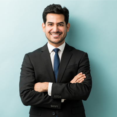 Headshot of Prakash Kumar, a business traveler and happy guest at Raaj Hotel.