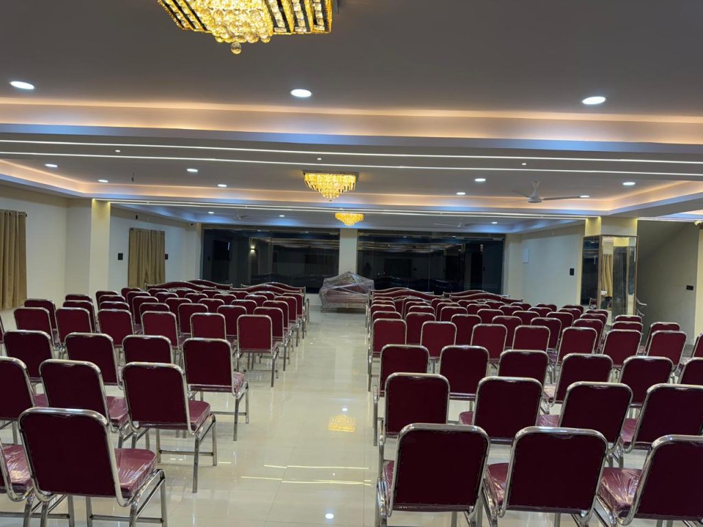 The President Banquet Hall at Raaj Hotel, set up for a professional corporate conference.