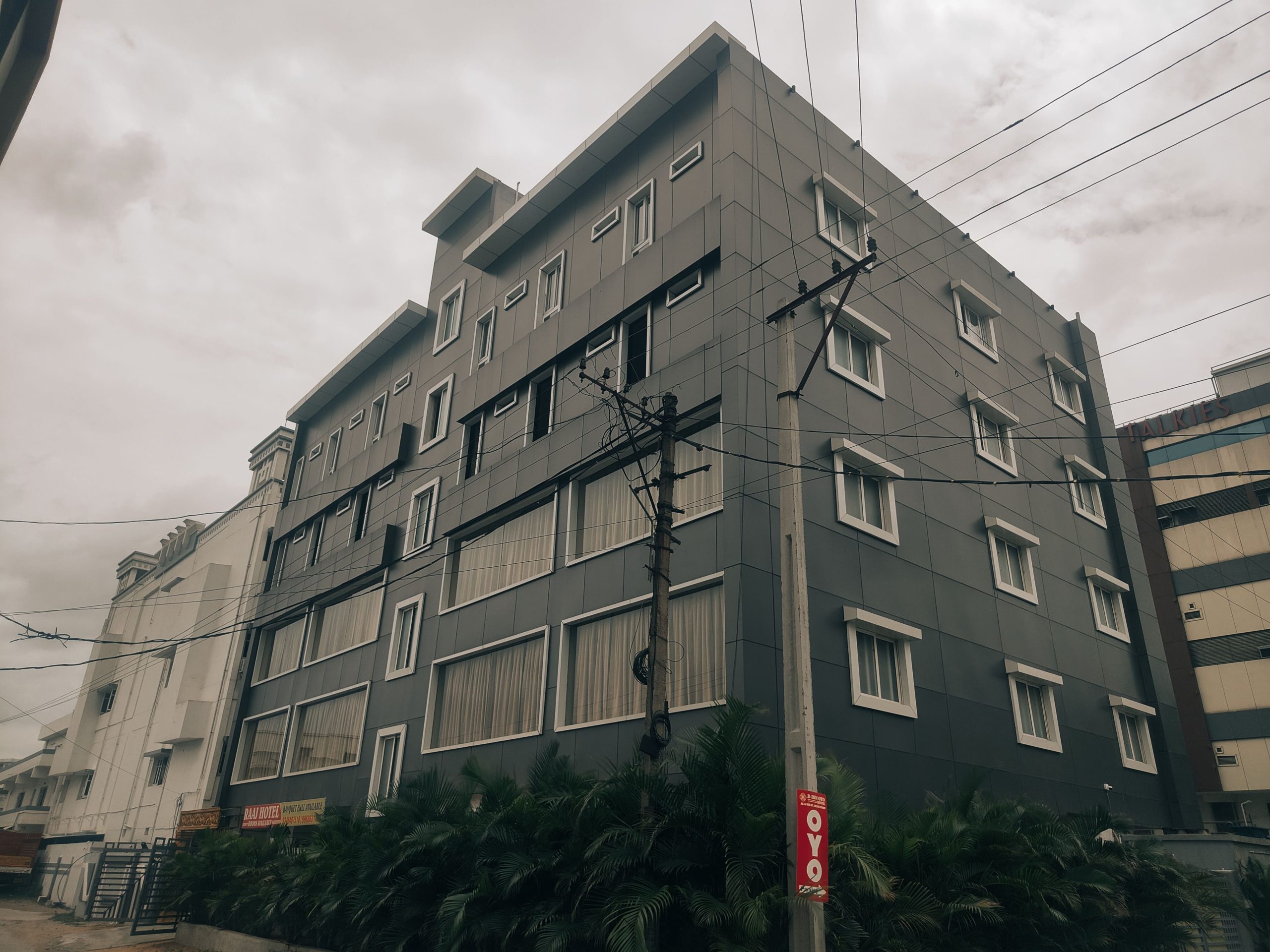 The main entrance of the Raaj Hotel and its two banquet halls in Mallapur, a premier hospitality venue built by Nice Design & nice Constructions.